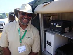 Howard Neely shown with an embedded computer that implements computer vision capabilities for an autonomous vehicle.  Mr. Neely led the software development effort for this embedded system.